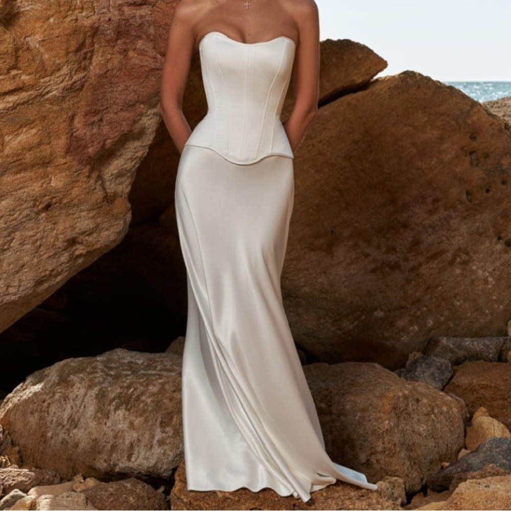 Pearl white corset top and long skirt. Matching set. Never worn.
